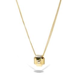 Gold and Diamond Cross Pendant